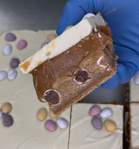 Milkybar & Mini Egg Cookie Millionaires ^